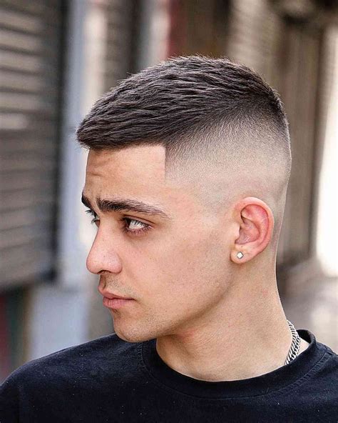 12 Awesome Man Bun Hairstyles With a Fade for 2026 | High and tight ...