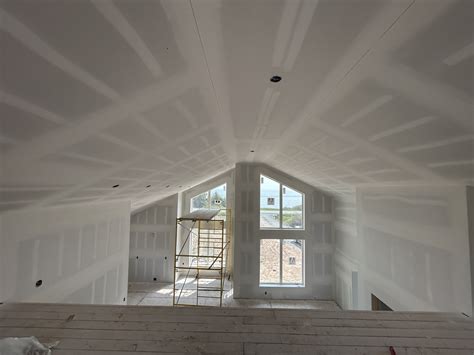 Mud and tape on vaulted ceiling
