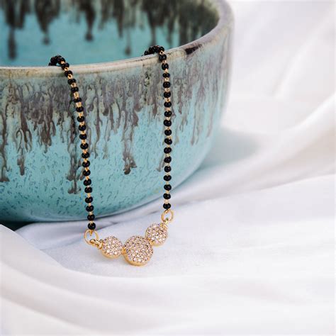 Golden Epoch Mangalsutra – Opal Touch