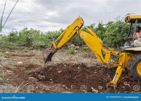 Image result for Backhoe Digging Hole