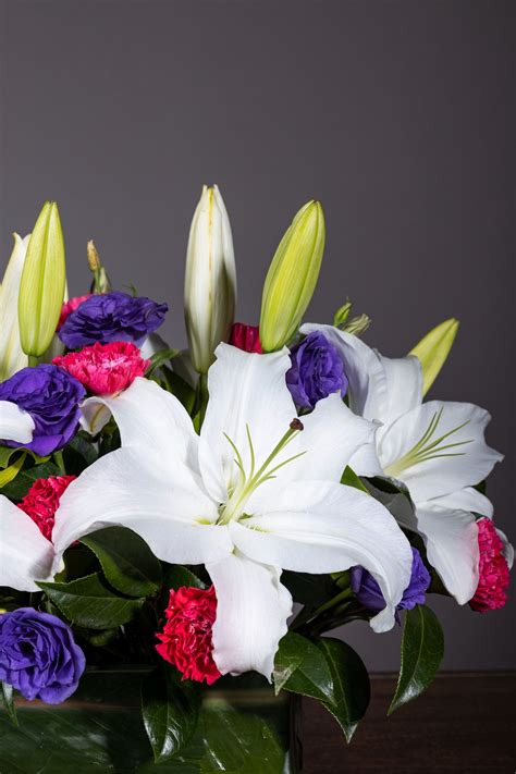 Order White Lilies & Carnation Flower Bouquet | Flower Delivery in ...