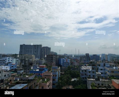 Bangladesh capital Dhaka city landscape on a sunny morning. Blue sky ...