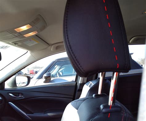 How To Pull Car Headrest Down