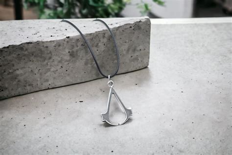 Handmade Assassin's Necklace - Silver-Plated Assassin Symbol India | Ubuy