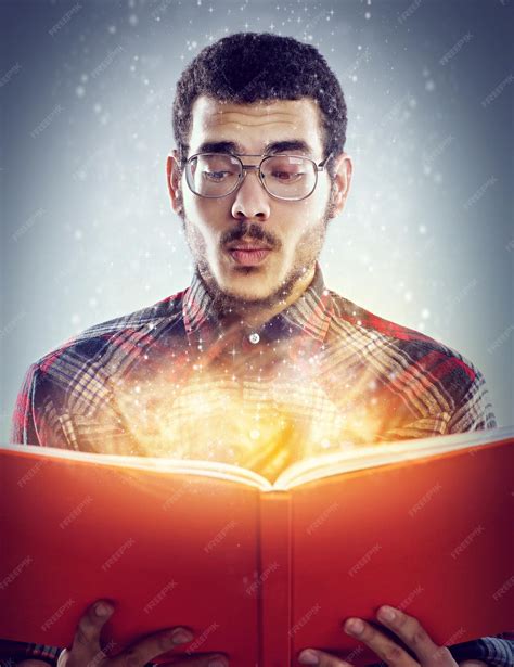 Premium Photo | Thinking glowing book and man with story fantasy and ...