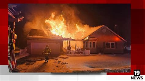 Broadview Heights firefighters make rescue during massive house fire