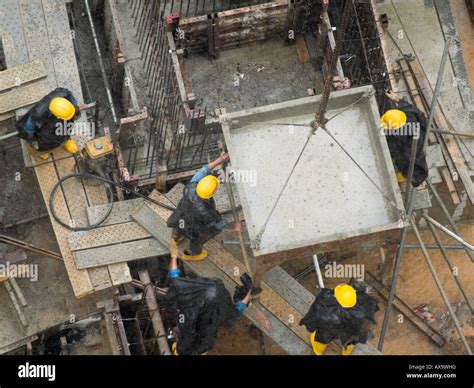 Pouring Concrete in the Rain Stock Photo - Alamy