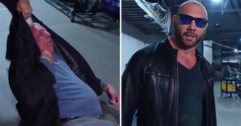 Batista Returns To WWE RAW By Attacking Ric Flair On His Birthday And ...