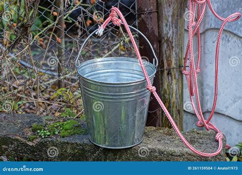 One Gray Metal Zinc Bucket a Red White Rope Near a Well Stock Photo ...