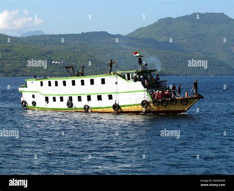 Maumere, Indonesia-May 23, 2023: An inter-island ferry in Indonesia is sailing from the port of ...