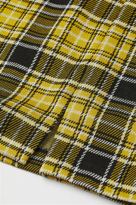 Short skirt - Yellow/Checked - Ladies | H&M IN