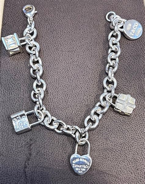 Tiffany and Co. Sterling Silver Heart Tag Lock and Bag Charm Bracelet ...