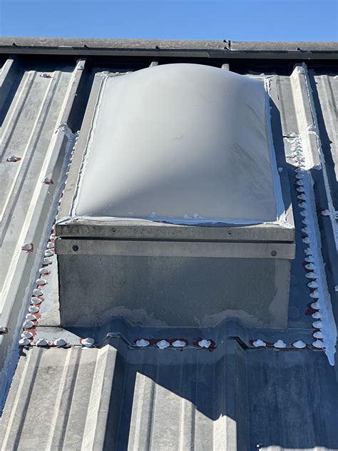 Metal Roof Maintenance with Seam Sealing and Skylight Care | Ducks Back ...