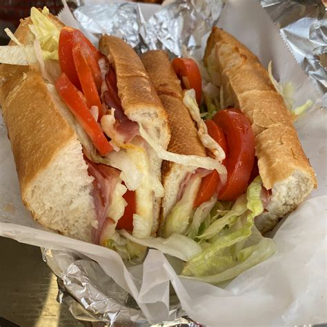 PizzaMan Dan's — Our submarine sandwiches are made fresh and served...