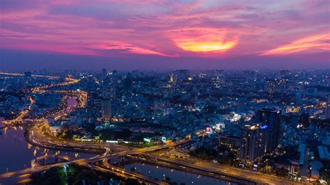 Download wallpaper 2560x1440 city, cityscape, aerial view, sunset ...