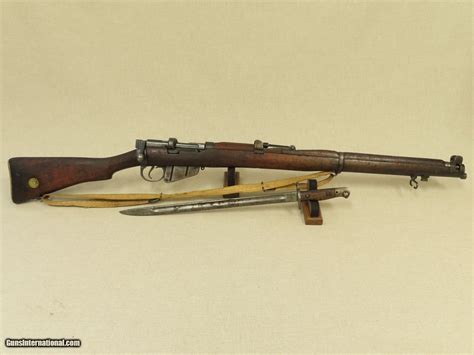 Lot LEE-ENFIELD MK III RIFLE WITH BAYONET, SLING, AND COVER, 40% OFF
