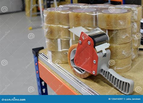 Tape Dispenser and Many New Packing Tapes Stock Image - Image of ...