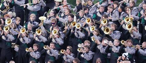 Medina High School marching band performs during their game against ...