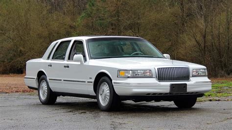 1995 Lincoln Town Car at Indy 2023 as T136 - Mecum Auctions
