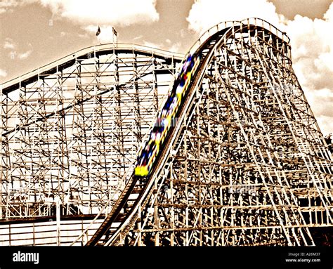 Old fashioned wooden roller coaster Stock Photo - Alamy