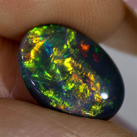 stunning black opal | Australian black opal, Expensive jewelry luxury, Black opal
