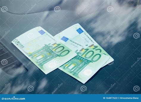 Euro Banknotes on the Dashboard and Their Reflection in the Windshield ...