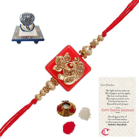 Designer Religious Ganesha Rakhi with Lord Ganesha Marble Chowki and ...