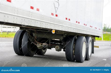Dual Wheels Trailer Axles On The Running On The Road Dry Van Semi Trailer With Cargo Royalty ...