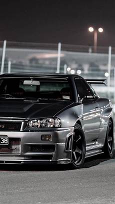 Gtr R34 Wallpaper Iphone by Cars Nissan Skyline R34 Gt R Front Angle View Wallpapers Gtr R34 Wallpaper Iphone