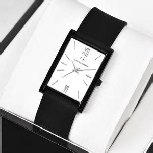 CHARLIEKEEN Sleek black rectangular case with minimalist white dial by ...