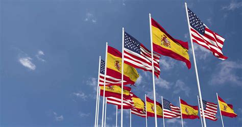 United States and Spain Flags Waving Together in the Sky, Seamless Loop ...