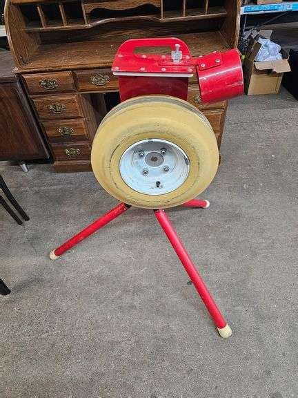 Image result for Antique Pitching Machine