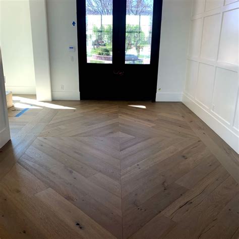 Unique Wood Flooring Transition in Hallway