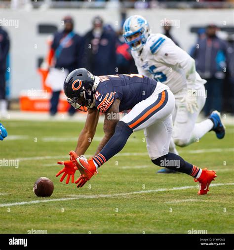 Chicago Bears DJ Moore (2) picks up a fumble during an NFL football ...