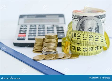 Dollar Bills Tied Up with Yellow Measuring Tape Suggesting Measurement of Financial Status Stock ... - measurement of dollar bill