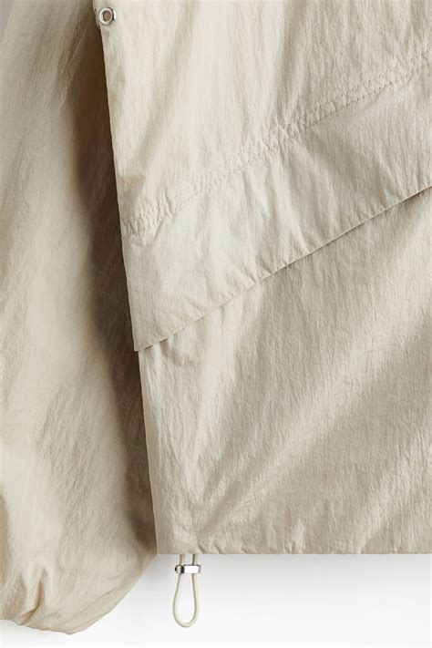 Loose Fit Nylon windbreaker - Light beige - Men | H&M IN