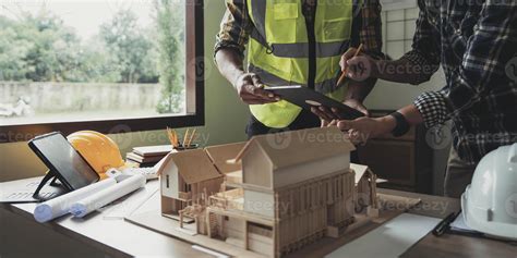 Engineer Teamwork Meeting, Drawing working on blueprint meeting for project working with partner ...