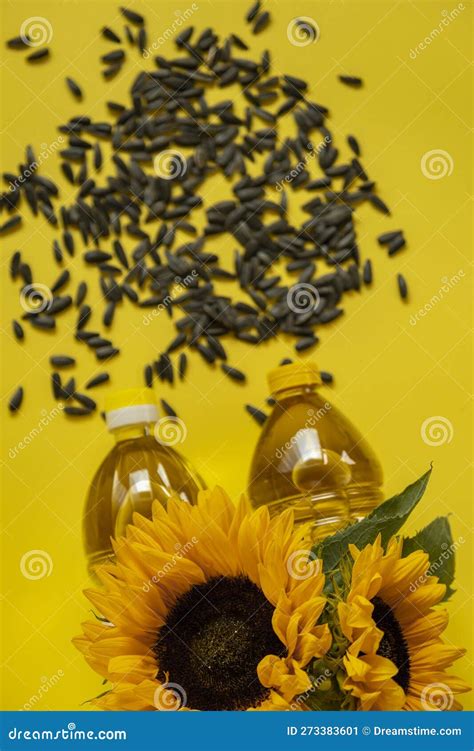 Oil Bottles, Sunflower Seeds and Sunflowers Blooming .Organic Sunflower ...