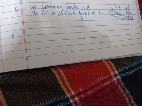 Find the smallest number which is divisible by 65 and 117 - Brainly.in