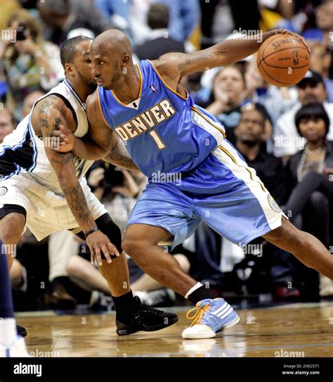 Denver Nuggets guard Chauncey Billups (1) works against Orlando Magic ...