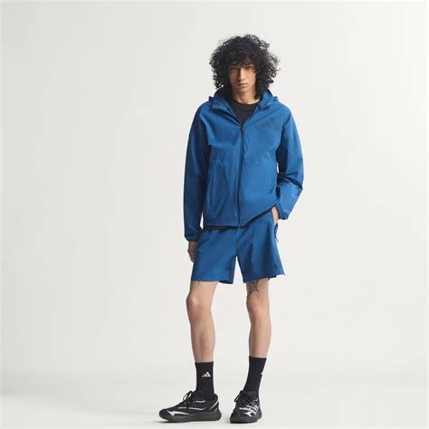 ADIDAS Z.N.E. WOVEN TRACK TOP - Blue | adidas India