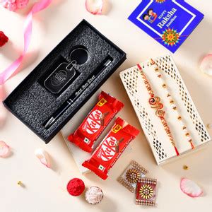 PRIDE STORE 2 Kit Kat Chocolate,Bro, Dora Rakhi, Key Chain, Pen, ,Tilak ...