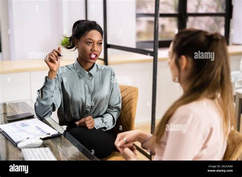 Two Business People Talking 的图像结果