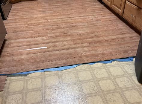 Squeaky floors. Found linoleum glued to 1/4” over 3/4” plywood. How do ...