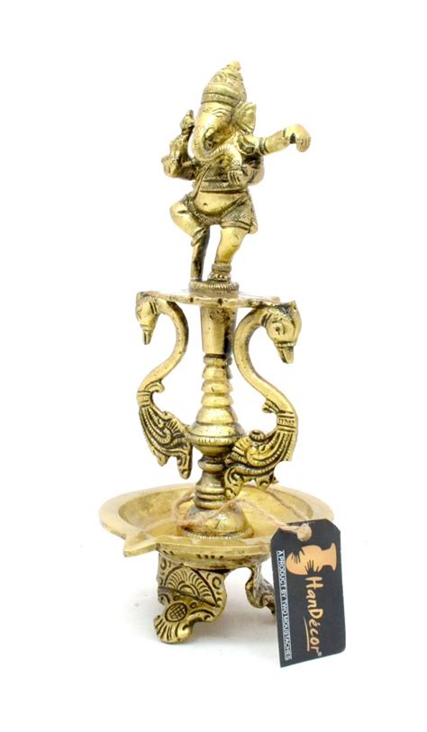 Buy Brass Dancing Ganesha Oil Diya with Base Brass Showpiece Online at ...