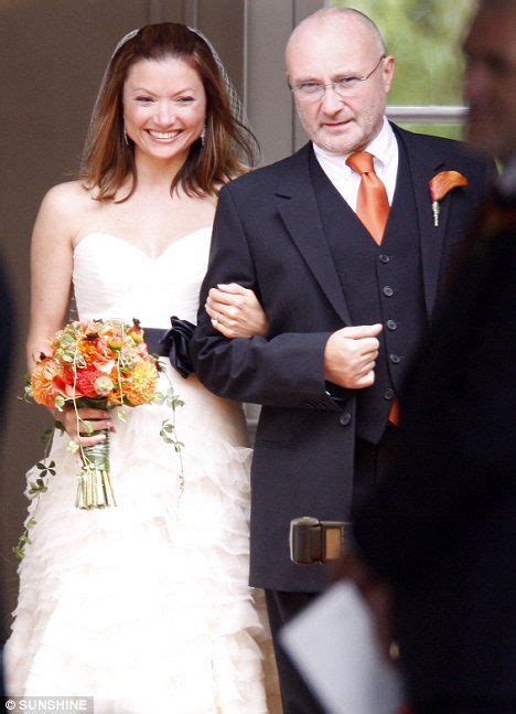 Steptoe and daughter: Phil Collins smiles as he emerges from £25m ...
