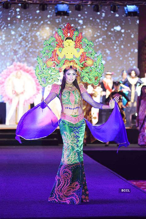 Moriska Momo from Indonesia walks the ramp in her traditional attire ...