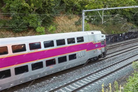 Premium Photo | Railroad tracks and a train represent journey ...