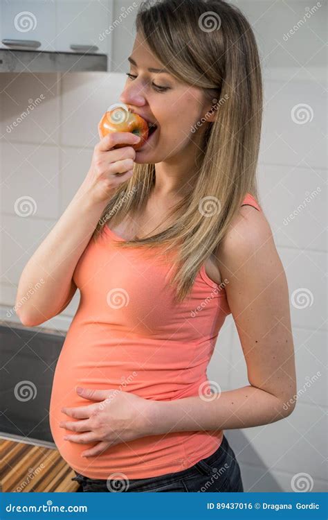 Healthy Pregnant Woman Eating Vitamin Rich Apple. Pregnant Woman Stock Photo - Image of ...
