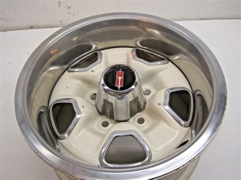 14" x 7" JJ Oldsmobile Cutlass Supreme Rally wheel trim ring bolt on ...